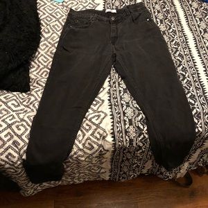 Worn black jeans